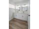 Bathroom featuring double sinks, modern fixtures, and bright lighting at 4269 Roanridge Ave, Las Vegas, NV 89120
