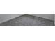 Close up of gray carpet and baseboard with white walls at 4269 Roanridge Ave, Las Vegas, NV 89120