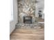 Unique stone fireplace feature that accents the living room at 4269 Roanridge Ave, Las Vegas, NV 89120