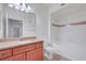 Bathroom featuring a large mirror, granite countertops, tub and shower at 4400 S Jones Blvd # 1125, Las Vegas, NV 89103