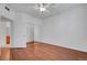 Bedroom with wood floors, sliding closet doors, and en suite bathroom at 4400 S Jones Blvd # 1125, Las Vegas, NV 89103