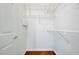 Walk-in closet with white wire shelving and wood flooring at 4400 S Jones Blvd # 1125, Las Vegas, NV 89103