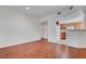 Open-concept living space flows into the kitchen, featuring hardwood floors and bright lighting at 4400 S Jones Blvd # 1125, Las Vegas, NV 89103