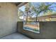 This cozy patio offers a quiet outdoor space with a view of the community's covered parking at 4400 S Jones Blvd # 1125, Las Vegas, NV 89103