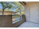 This patio has a concrete floor, a textured stucco wall, and a view of the covered parking area at 4400 S Jones Blvd # 1125, Las Vegas, NV 89103