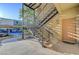 Unit 1125: Exterior stairwell leading to unit, with covered parking nearby at 4400 S Jones Blvd # 1125, Las Vegas, NV 89103