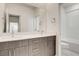 This bathroom includes a modern vanity with double sinks and a tub/shower combo at 532 Monarch Ridge Ct, North Las Vegas, NV 89084