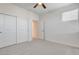 This bedroom includes carpet, closet space, and a bright window at 532 Monarch Ridge Ct, North Las Vegas, NV 89084