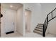 Inviting home entryway with tile flooring, staircase and access to additional rooms at 532 Monarch Ridge Ct, North Las Vegas, NV 89084