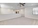 Loft area with carpet, bright natural light, and neutral colored walls at 532 Monarch Ridge Ct, North Las Vegas, NV 89084