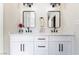 Stylish bathroom offers dual sinks, modern fixtures, and ample counter space for convenience at 5570 Palm St, Las Vegas, NV 89120