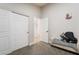 Comfortable bedroom features closet storage and sitting area with a cozy and functional space at 5570 Palm St, Las Vegas, NV 89120