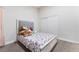 Inviting bedroom offers cozy decor, natural light, and a comfortable atmosphere at 5570 Palm St, Las Vegas, NV 89120