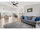 Open-concept living and dining area with wood floors, ample natural light, and modern decor at 5570 Palm St, Las Vegas, NV 89120