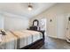 Main bedroom with dark-wood furniture and carpet flooring at 5570 Palm St, Las Vegas, NV 89120