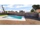 Sparkling pool area with a diving board and ample space for relaxation at 5570 Palm St, Las Vegas, NV 89120