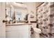 Clean bathroom featuring granite countertops and a decorative shower curtain at 5754 Cinnabar Ave, Las Vegas, NV 89110