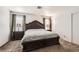 A traditional bedroom with a large bed and warm lighting at 5754 Cinnabar Ave, Las Vegas, NV 89110