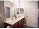 Functional bathroom with dual sinks, neutral colors, and practical layout for efficient use of space at 7252 Blowing Breeze Ave, Las Vegas, NV 89179