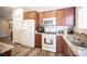 Cozy kitchen featuring stainless steel appliances and granite countertops at 7252 Blowing Breeze Ave, Las Vegas, NV 89179