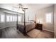 Serene main bedroom with large windows and natural light at 7252 Blowing Breeze Ave, Las Vegas, NV 89179