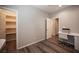 Home office with built in desk, open storage and LVP floors at 7252 Blowing Breeze Ave, Las Vegas, NV 89179