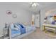 Charming bedroom featuring daybed and desk at 7960 Calito St, Las Vegas, NV 89166
