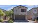 Charming two-story home featuring desert landscaping and a two-car garage at 7960 Calito St, Las Vegas, NV 89166
