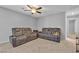 Spacious carpeted loft area with comfortable seating, perfect for relaxation and entertainment at 7960 Calito St, Las Vegas, NV 89166