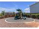 Community playground area offers a slide and climbing structure for outdoor fun at 7960 Calito St, Las Vegas, NV 89166