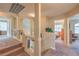 Upstairs landing featuring decorative glass windows and hallway access to bedrooms at 8737 Autumn Valley Ave, Las Vegas, NV 89129