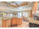 Bright kitchen with stainless steel appliances, granite countertops, and an open concept to the basement at 8737 Autumn Valley Ave, Las Vegas, NV 89129