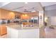 Well-equipped kitchen featuring stainless steel appliances, granite countertops, and a large island at 8737 Autumn Valley Ave, Las Vegas, NV 89129