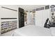 A lively game themed room features collectibles, a desk, and closet space at 8937 Pelican Point St, Las Vegas, NV 89178