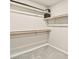 Walk-in closet featuring built-in shelves and carpet at 8937 Pelican Point St, Las Vegas, NV 89178