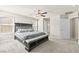 Spacious main bedroom with ceiling fan and ensuite bathroom at 8937 Pelican Point St, Las Vegas, NV 89178