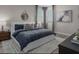 Serene bedroom featuring a comfortable bed, soft lighting, and modern decor at 1556 Pacific Baza St, Las Vegas, NV 89138