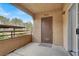 A view of the outdoor balcony with a door at 2200 S Fort Apache Rd # 1101, Las Vegas, NV 89117