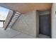 Condominium entrance featuring covered walkway, outdoor stairs, and neutral-toned exterior at 2200 S Fort Apache Rd # 1101, Las Vegas, NV 89117