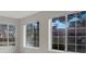 Bright living room with large windows offering views of the surrounding neighborhood at 2200 S Fort Apache Rd # 1101, Las Vegas, NV 89117