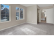 Bedroom features neutral walls, carpet, and windows overlooking the outdoors at 2200 S Fort Apache Rd # 1101, Las Vegas, NV 89117