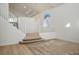 Spacious living room showcasing staircase and high ceiling at 2204 Ambermill Ct, Henderson, NV 89052