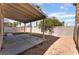 View of backyard featuring a covered patio and low maintenance landscaping at 2400 Dutchmans Pipe Ct, Las Vegas, NV 89106