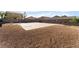 Large backyard featuring basketball court and low-maintenance gravel landscaping at 2400 Dutchmans Pipe Ct, Las Vegas, NV 89106