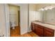Bathroom featuring a granite countertop vanity, a toilet and a shower and tub combo at 2451 N Rainbow Blvd # 1116, Las Vegas, NV 89108