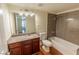 Bathroom featuring a granite countertop vanity, a toilet and a shower and tub combo at 2451 N Rainbow Blvd # 1116, Las Vegas, NV 89108