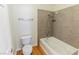 Bathroom featuring a toilet and a shower and tub combo at 2451 N Rainbow Blvd # 1116, Las Vegas, NV 89108