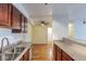 Bright kitchen with granite countertops and stainless steel sink at 2451 N Rainbow Blvd # 1116, Las Vegas, NV 89108