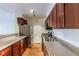 Modern kitchen with stainless steel appliances, granite countertops, and wooden cabinets at 2451 N Rainbow Blvd # 1116, Las Vegas, NV 89108
