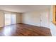 Bright living room featuring wood floors and access to the patio at 2451 N Rainbow Blvd # 1116, Las Vegas, NV 89108